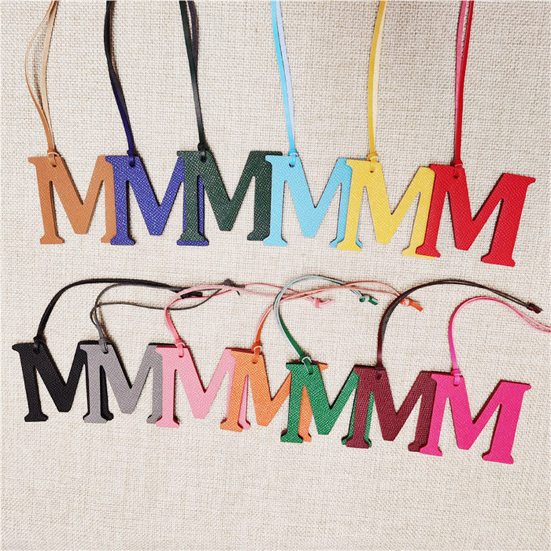 XMESSUN New English Letters M  - Monogram Keychain Leather ulasan dan harga